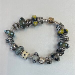 Pandora Silver and Gold Charm Bracelet with Green Accents
